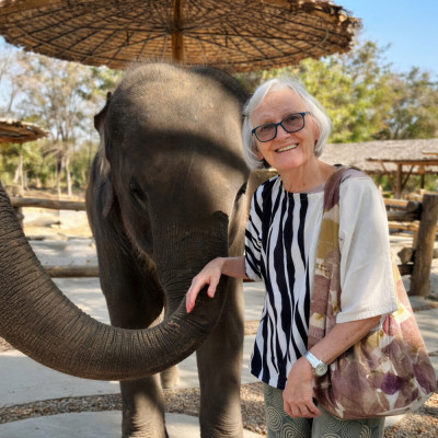 Senior resident participating in an enriching cultural experience in Thailand at Pang Dee