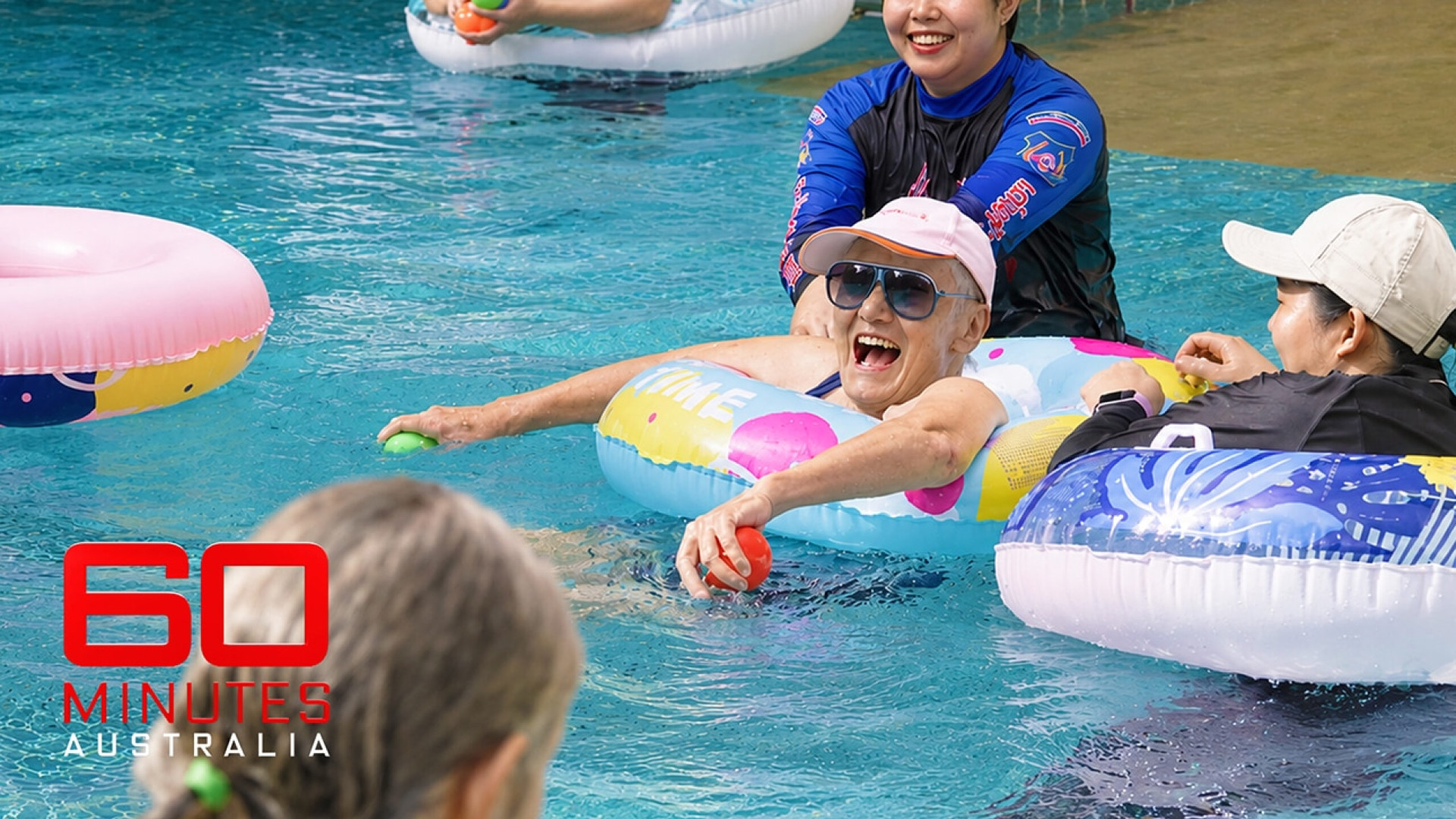 Senior residents in a pool water exercise class at a Chiang Mai aged care residence